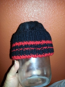 Baby hat worked in team colors for his brothers football team.